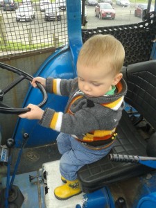 toddler in tractor