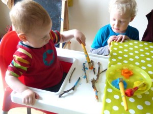 toddler painting sticks