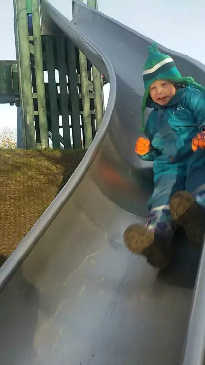 child on slide