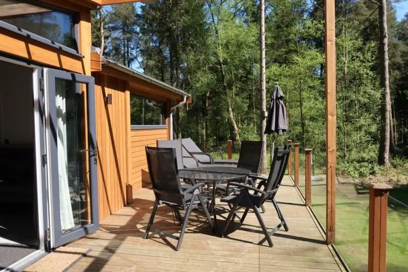 decking of spa lodge Darwin Forest seating area