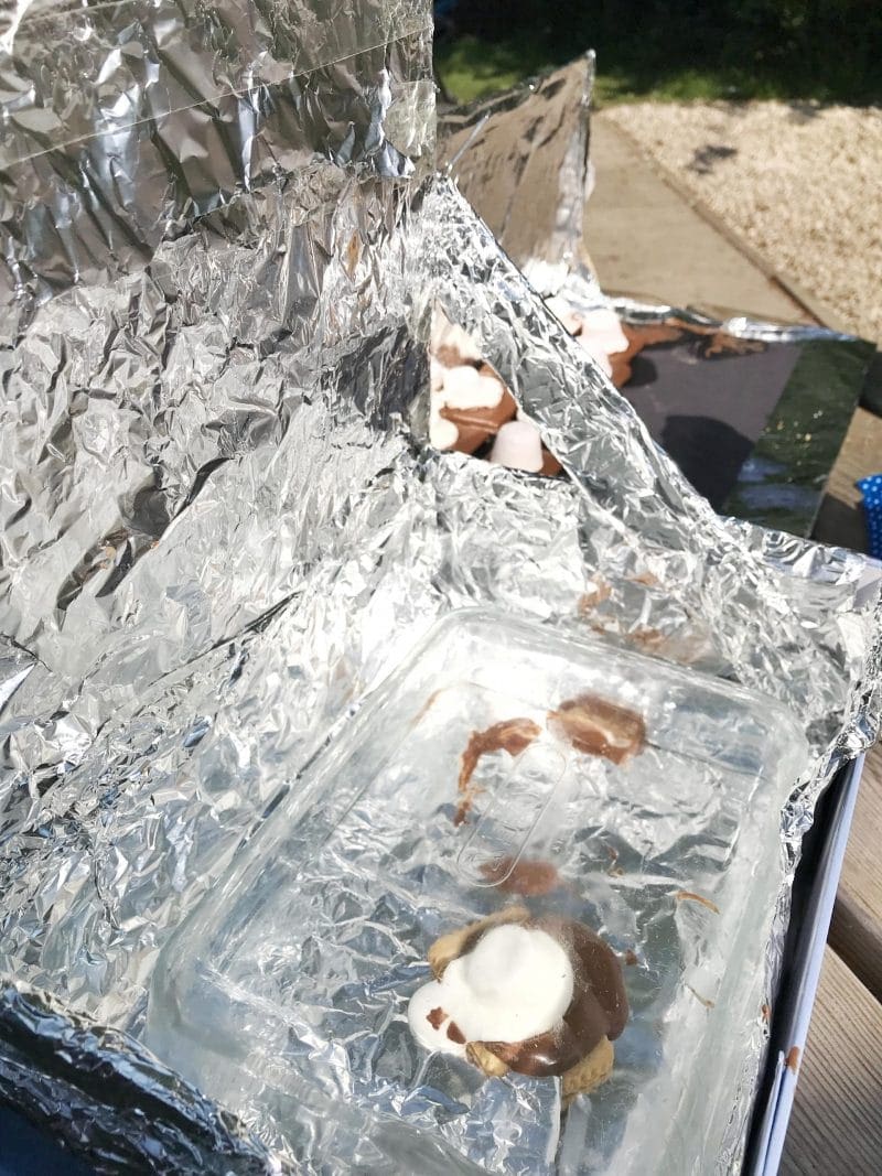 making s'mores with DIY solar oven