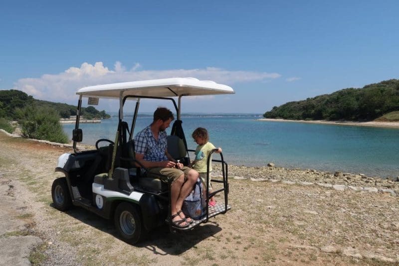 golf buggy by the sea
