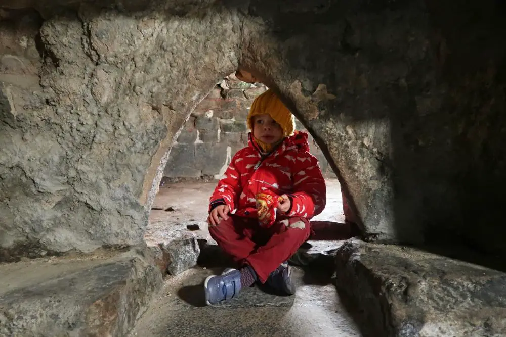 child in bread oven at castle