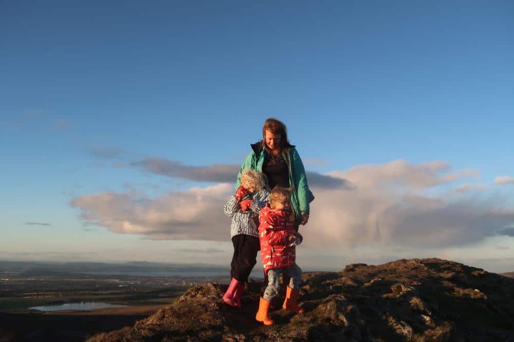 family at top of hill