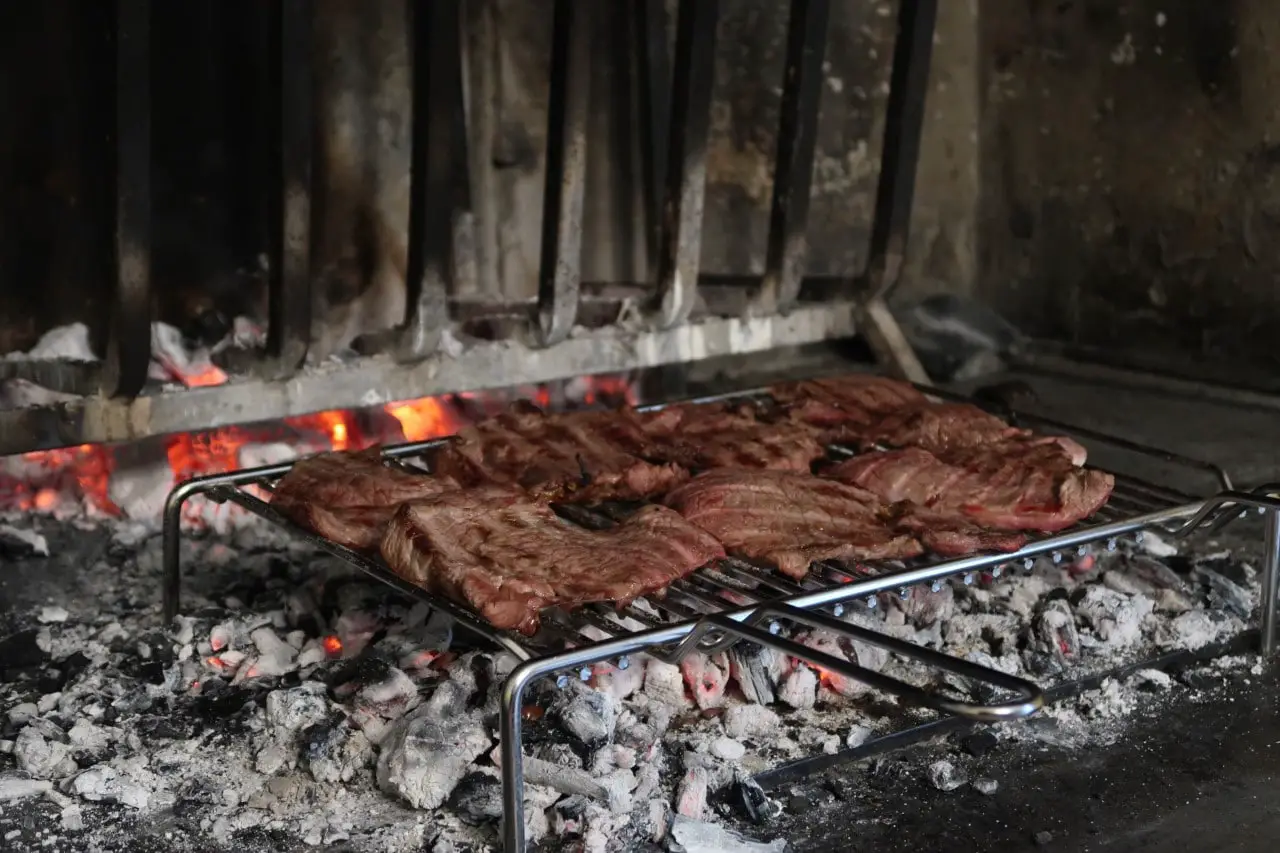 steak grilling on fire