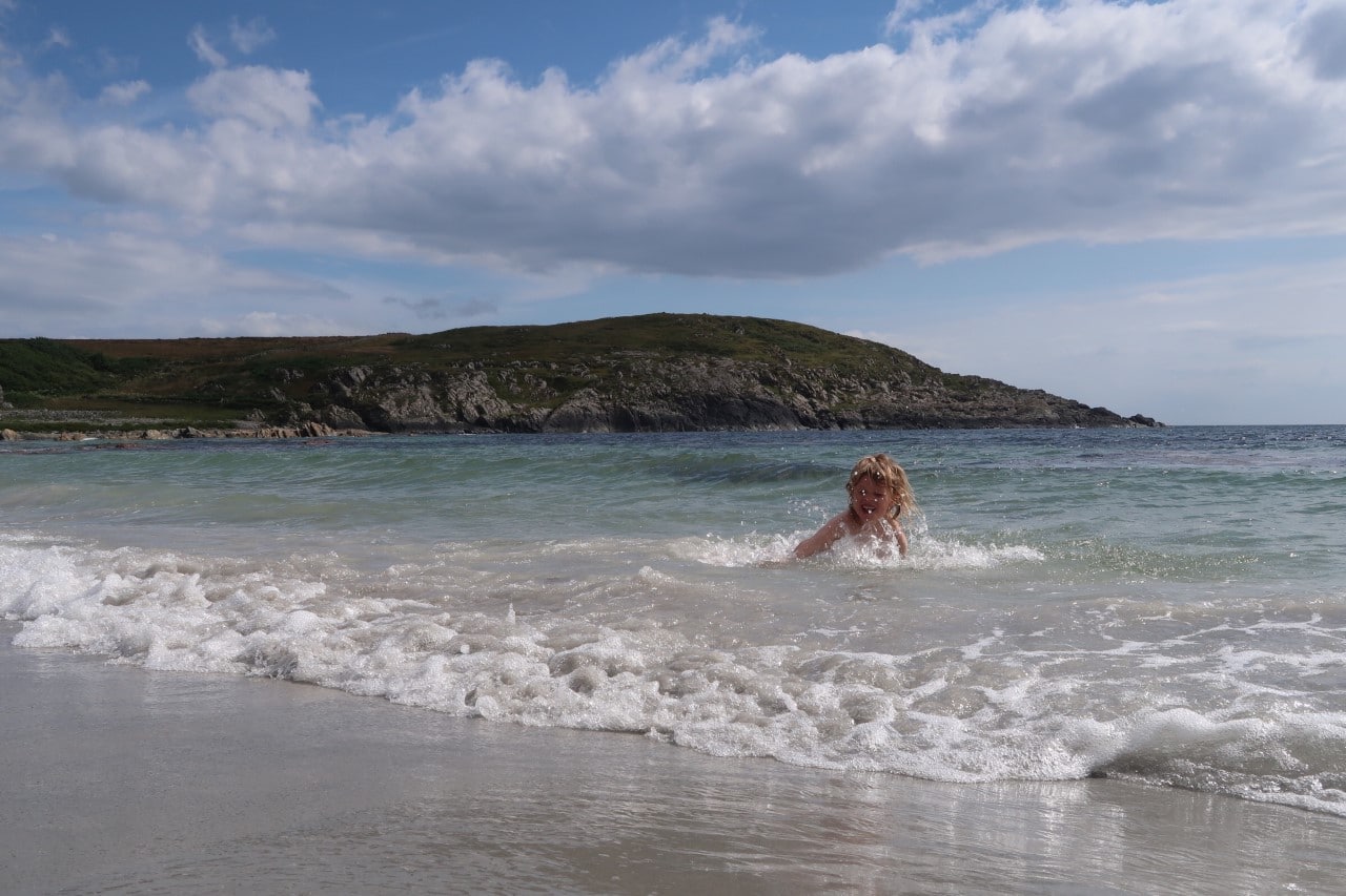 Playing on Gigha in the water