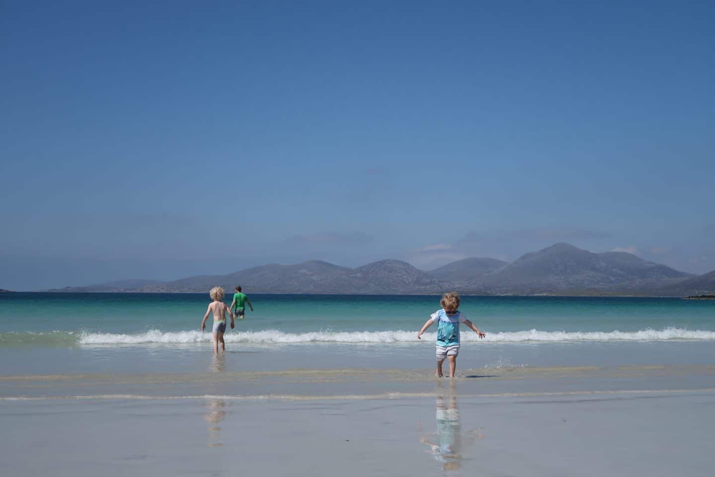 children playing on beach Harris