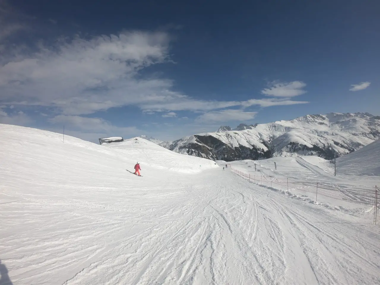 child skiing down the mountain