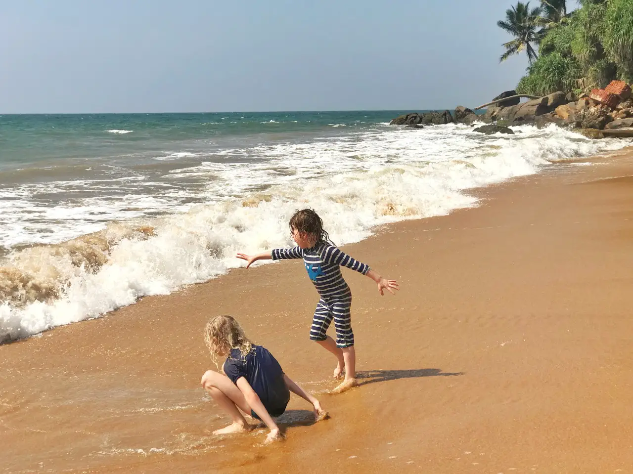 children playing on the Sri Lanka beach Colombo