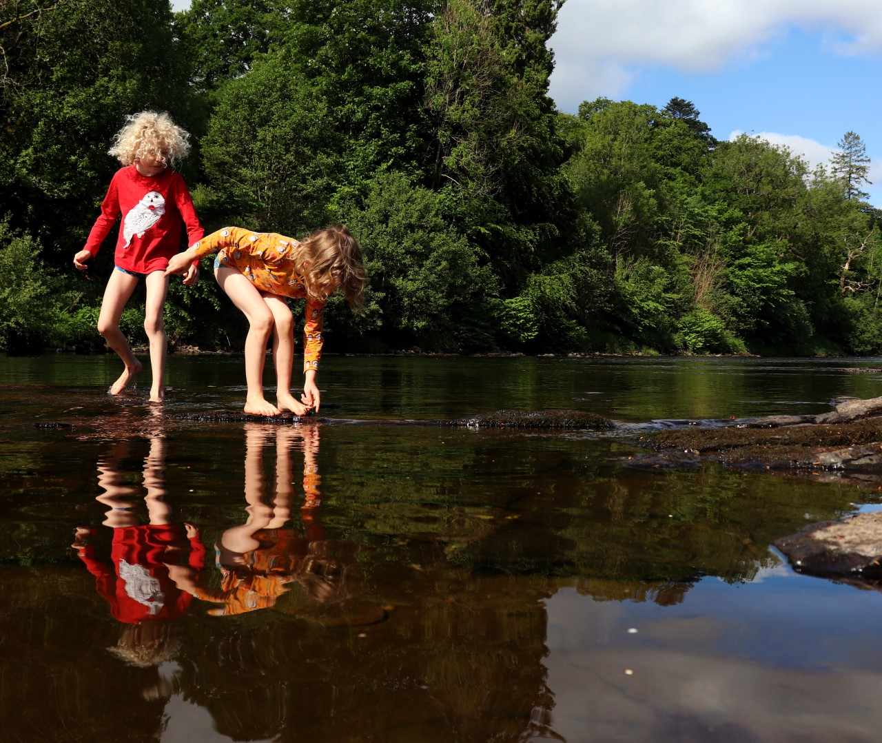 kids playing in river