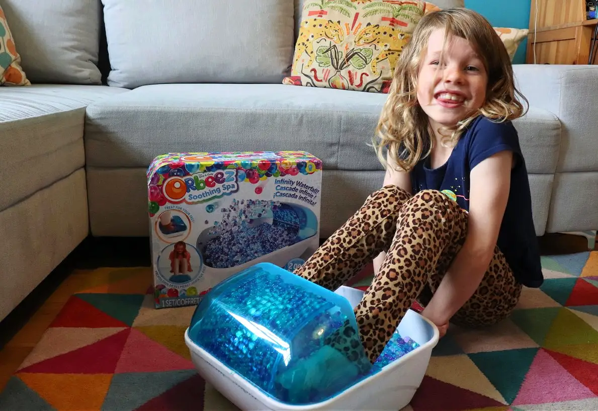 child using an orbeez foot spa