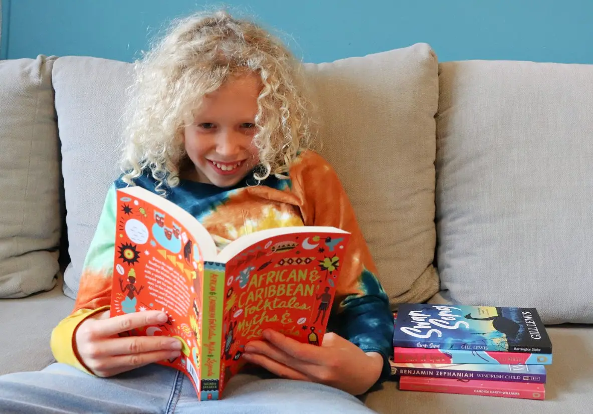 child reading inclusive and diverse books