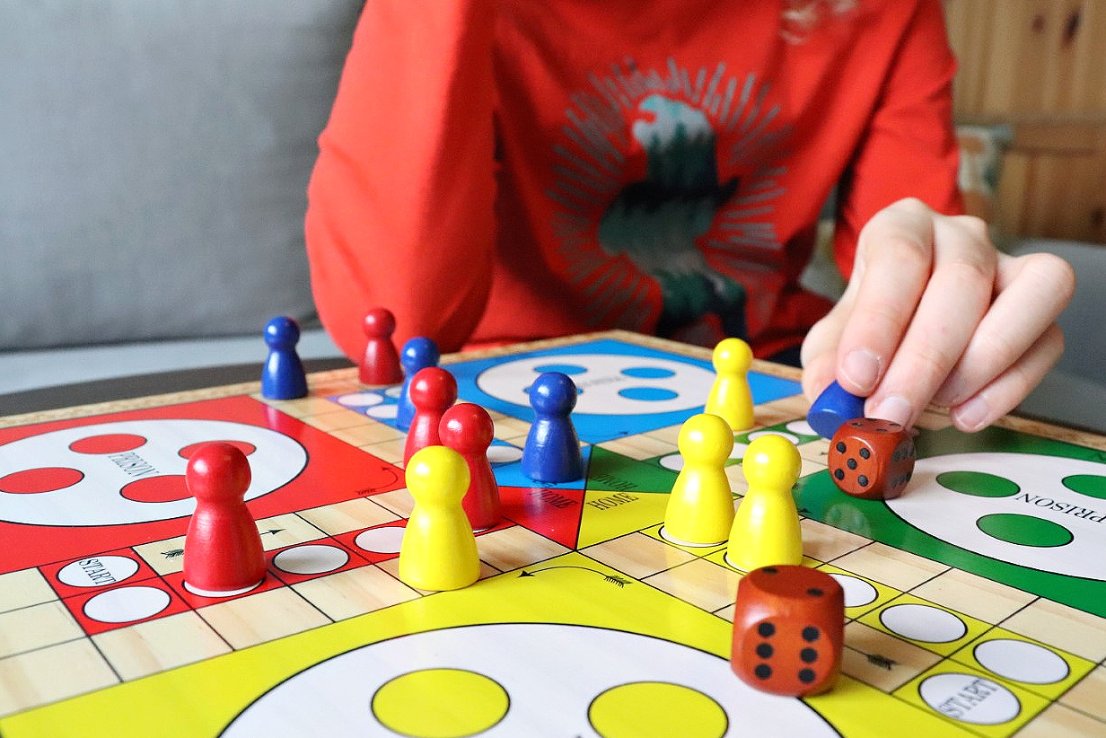 children playing Ludo
