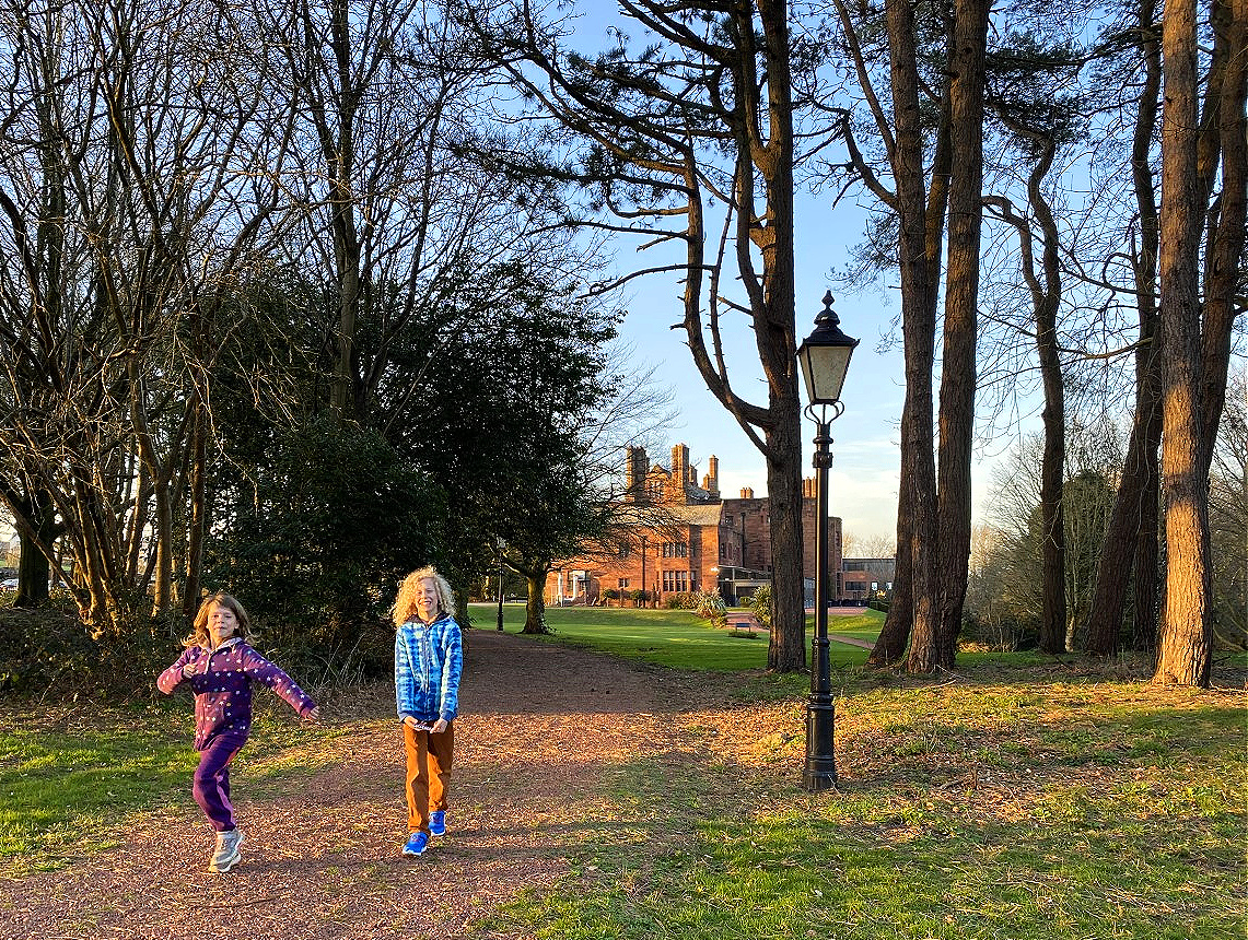 Children walking through Abbey House Hotel grounds