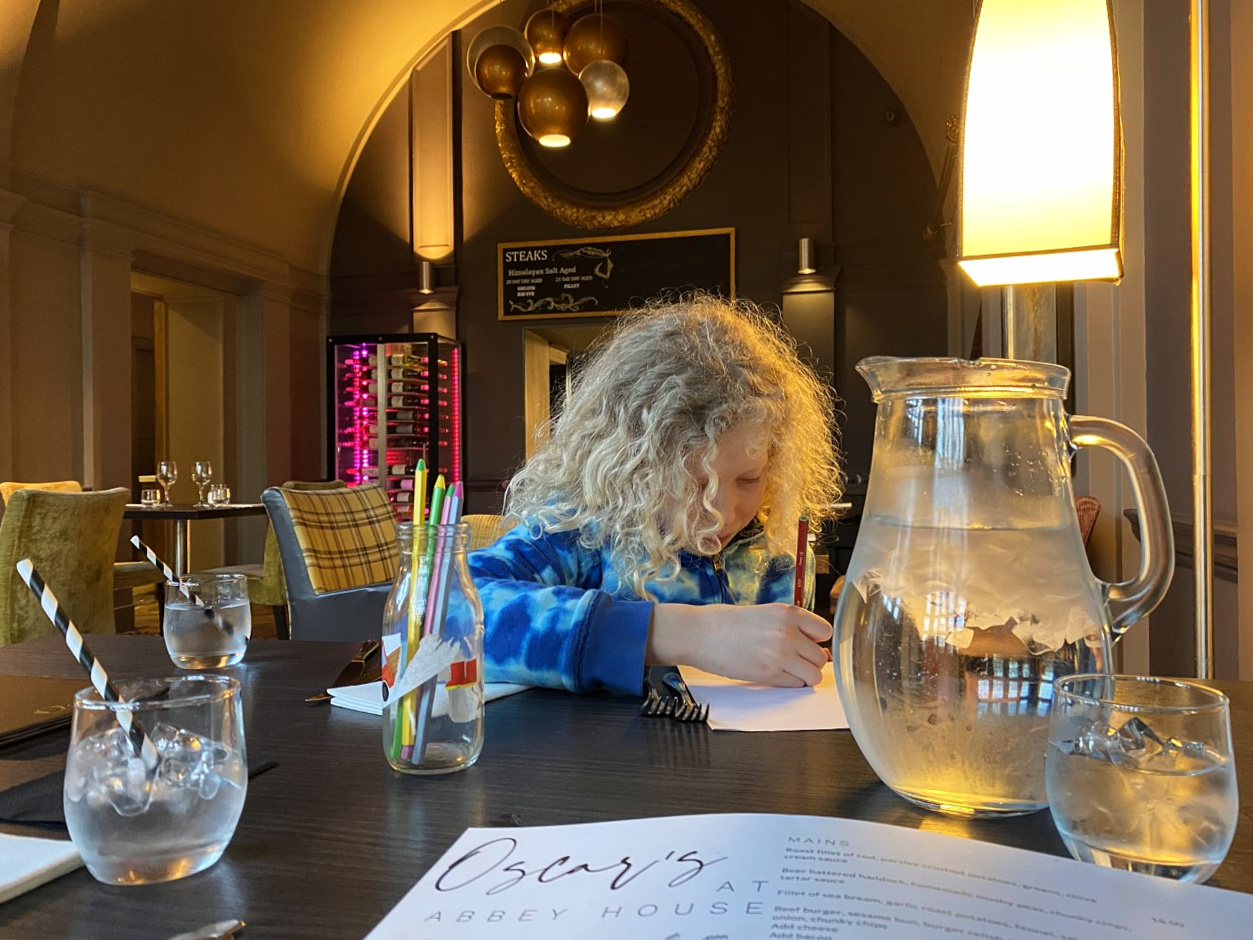 child drawing on back of menu at the Abbey House Hotel