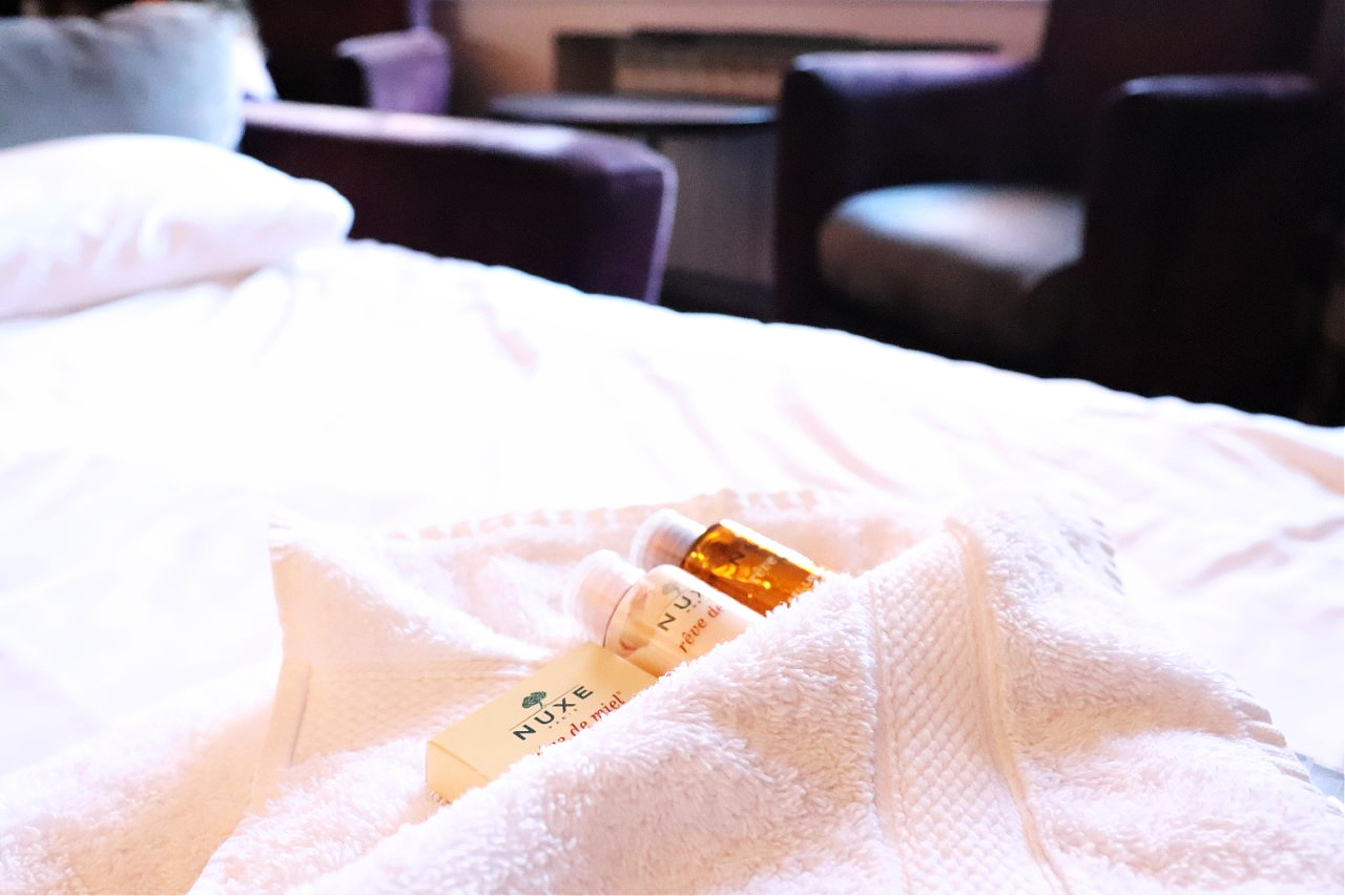 products on bed at Abbey House hotel