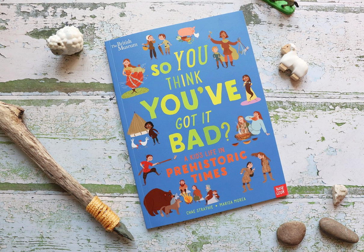 flatlay of childrens book and toys