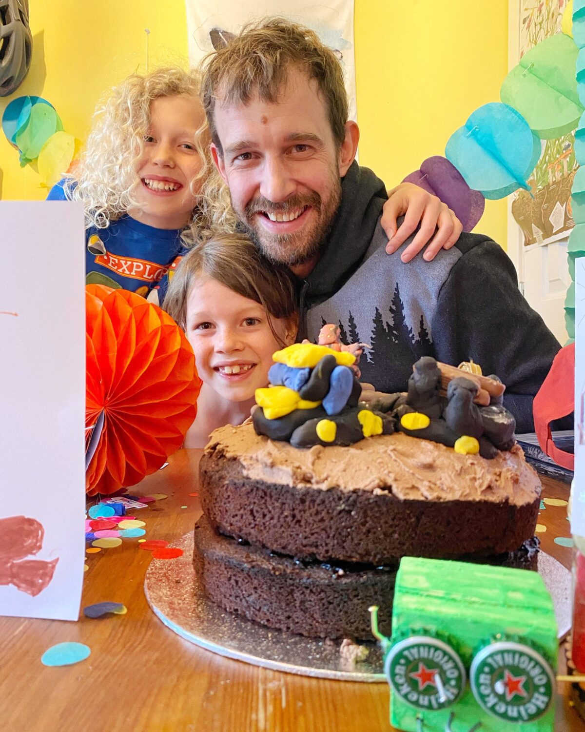 Homemade cake, children with dad and crads