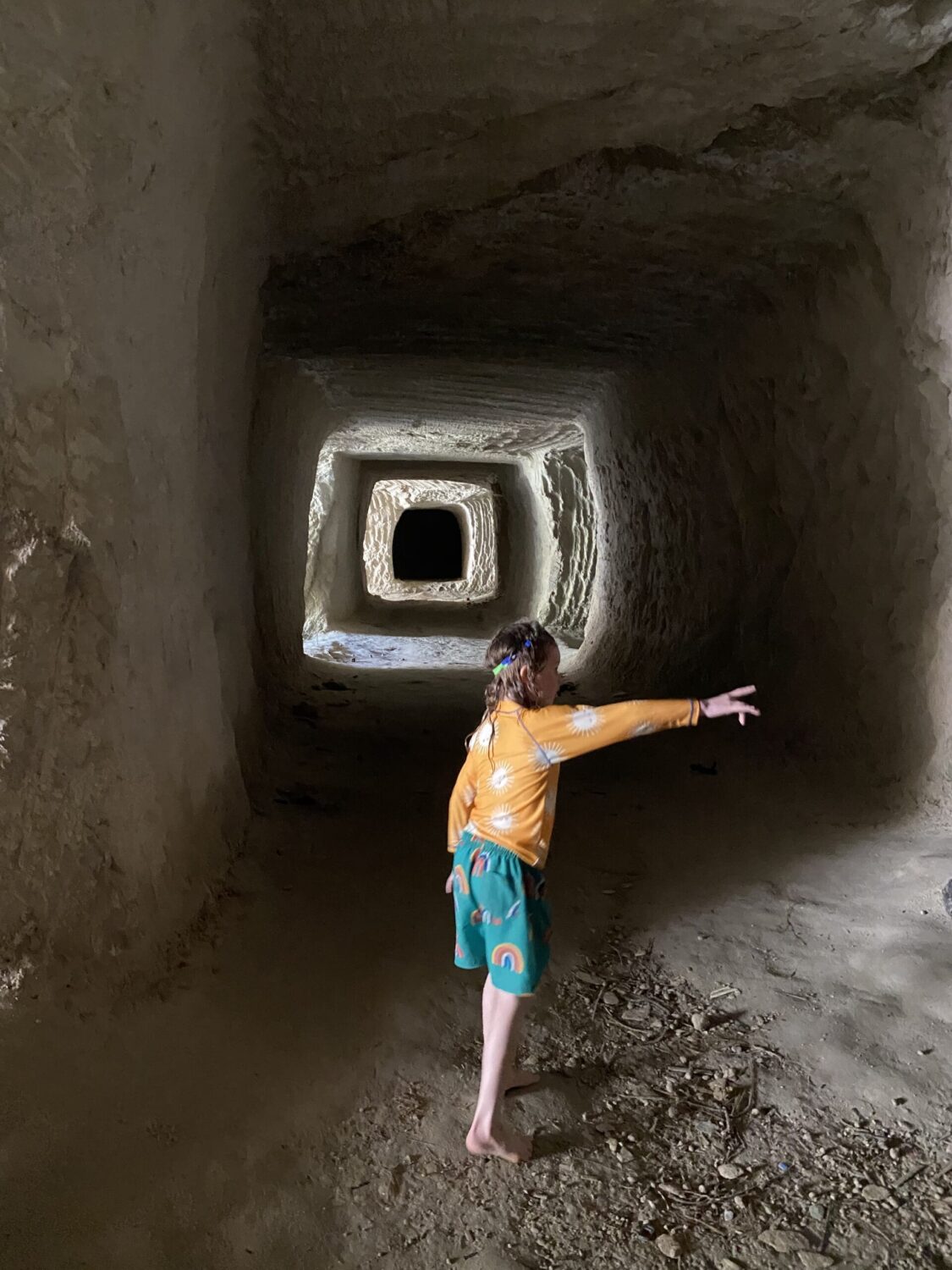 Child in rock mine network Sarakiniko Milos