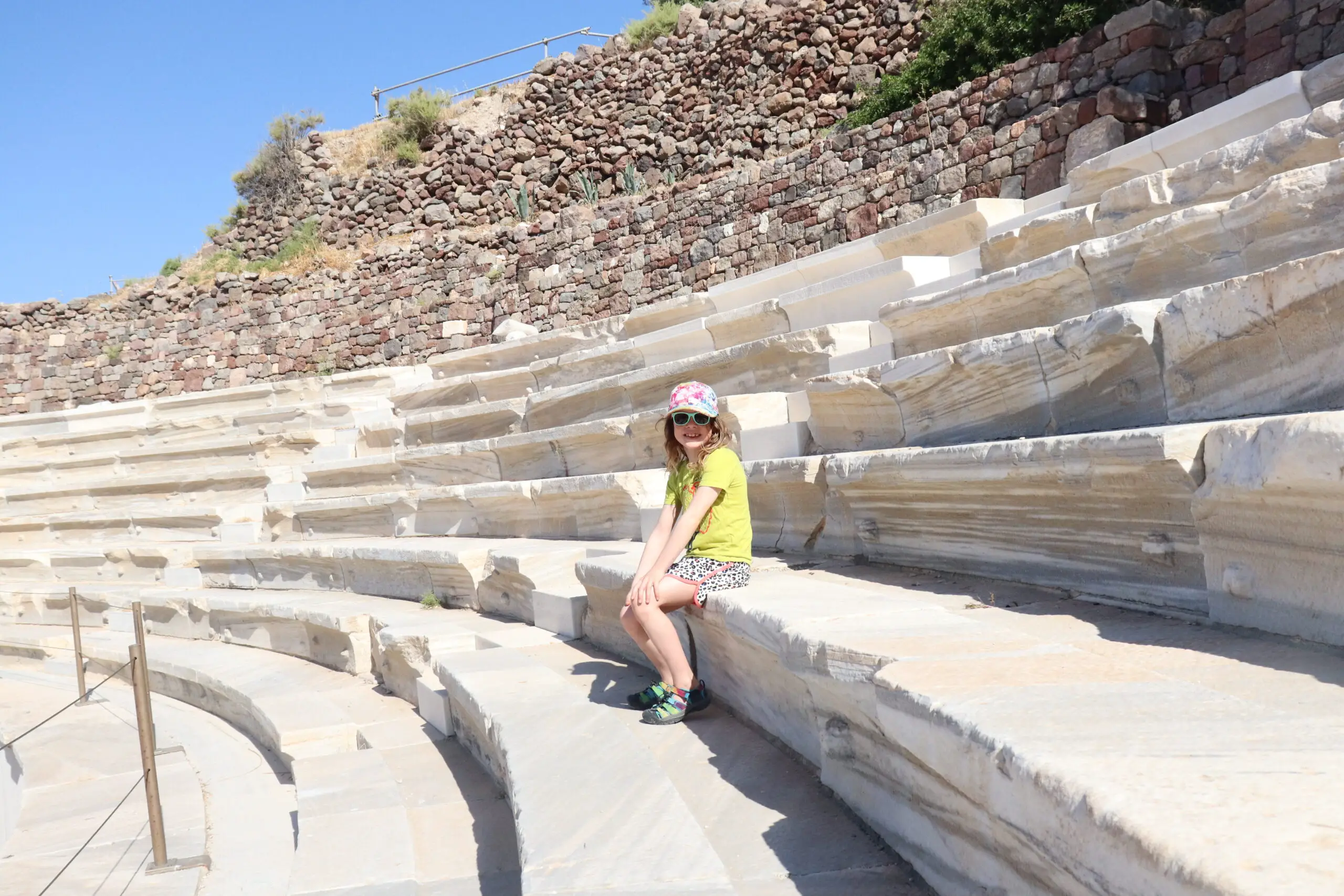 Child on seating in amphitheatre