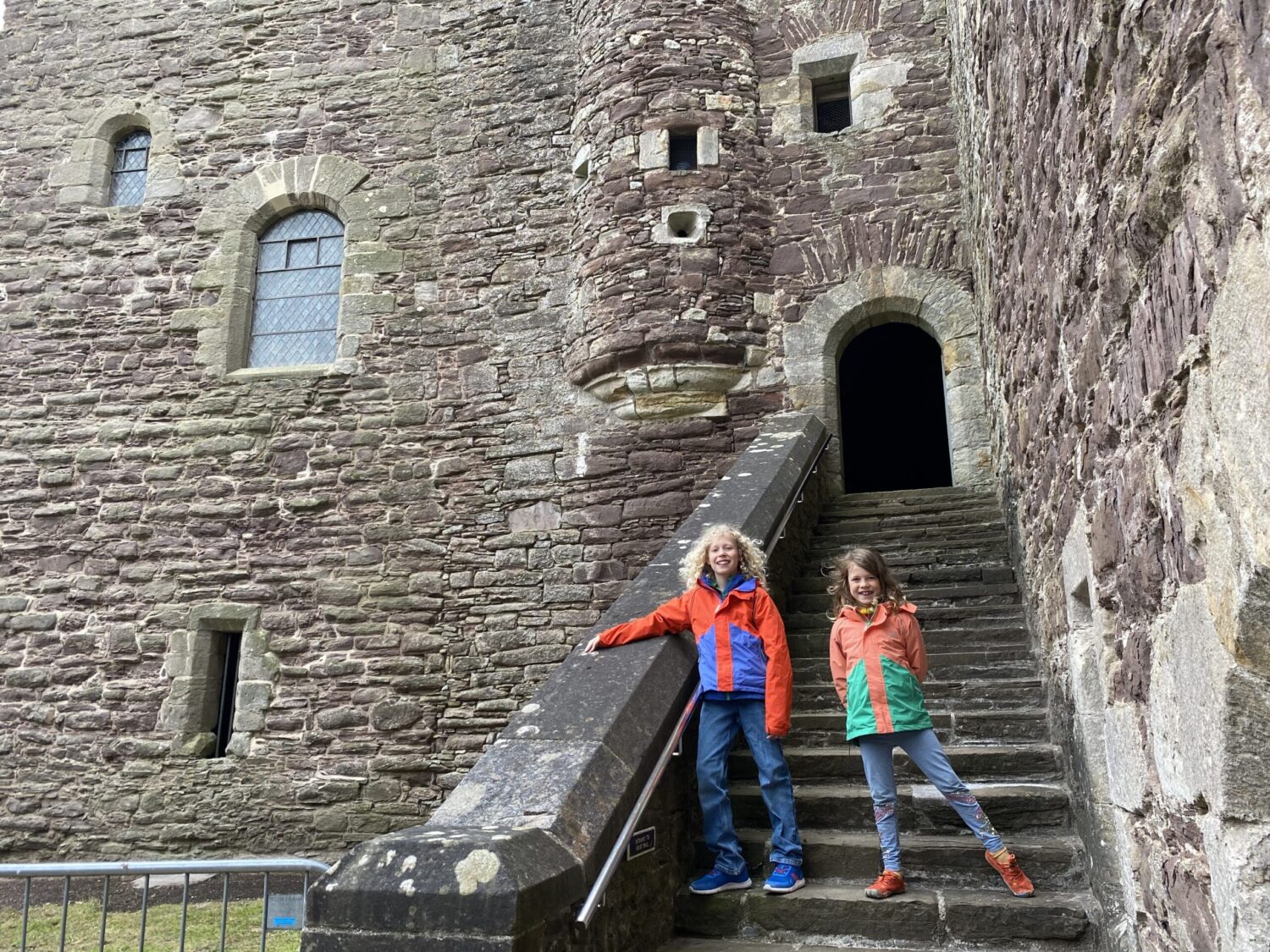 Children outside Doune Castle steps