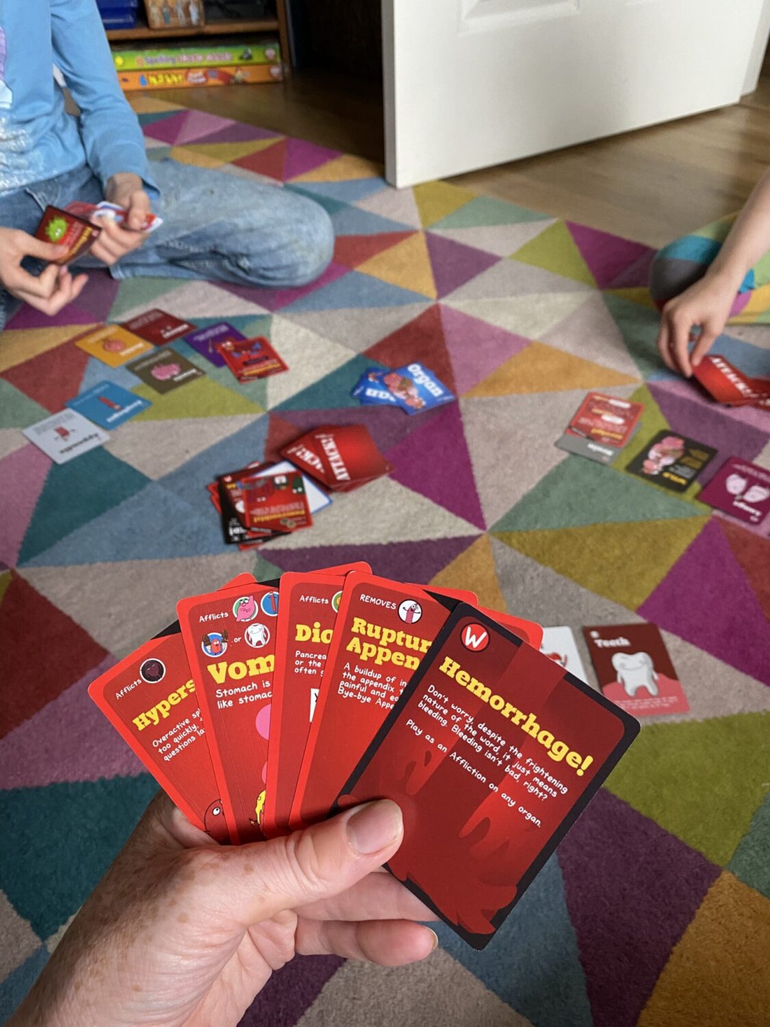 Child playing organ attack card game