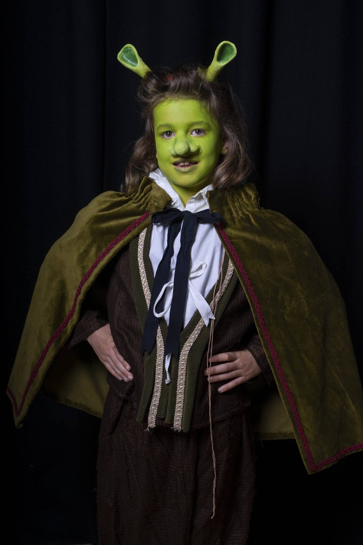 Child dressed as Shrek