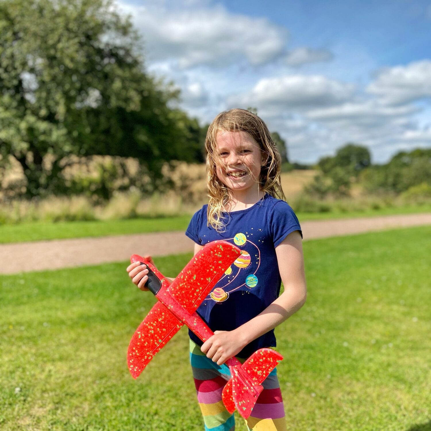 Child with toy plane