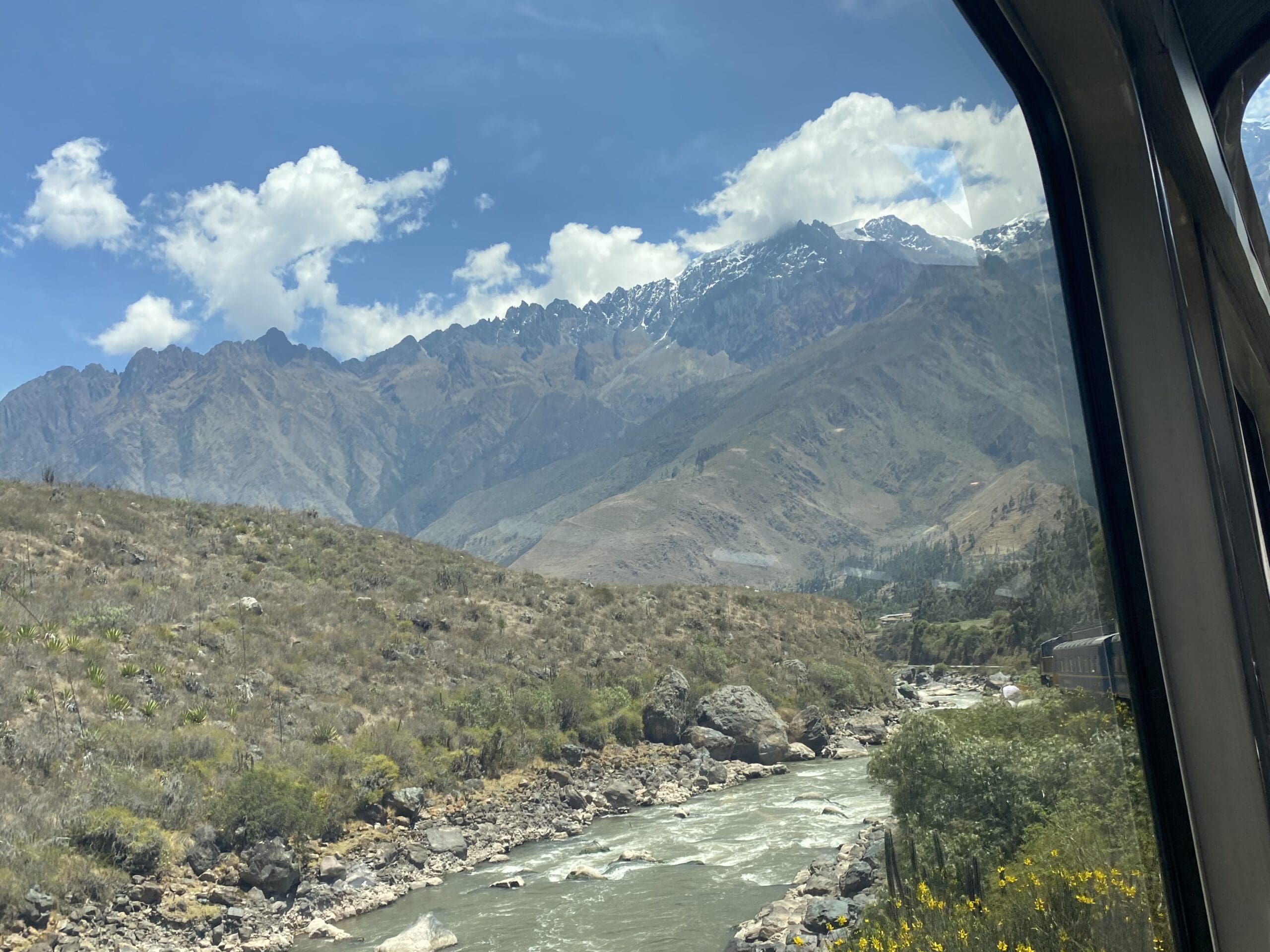 Windows on train overlooking the Andes mountains 