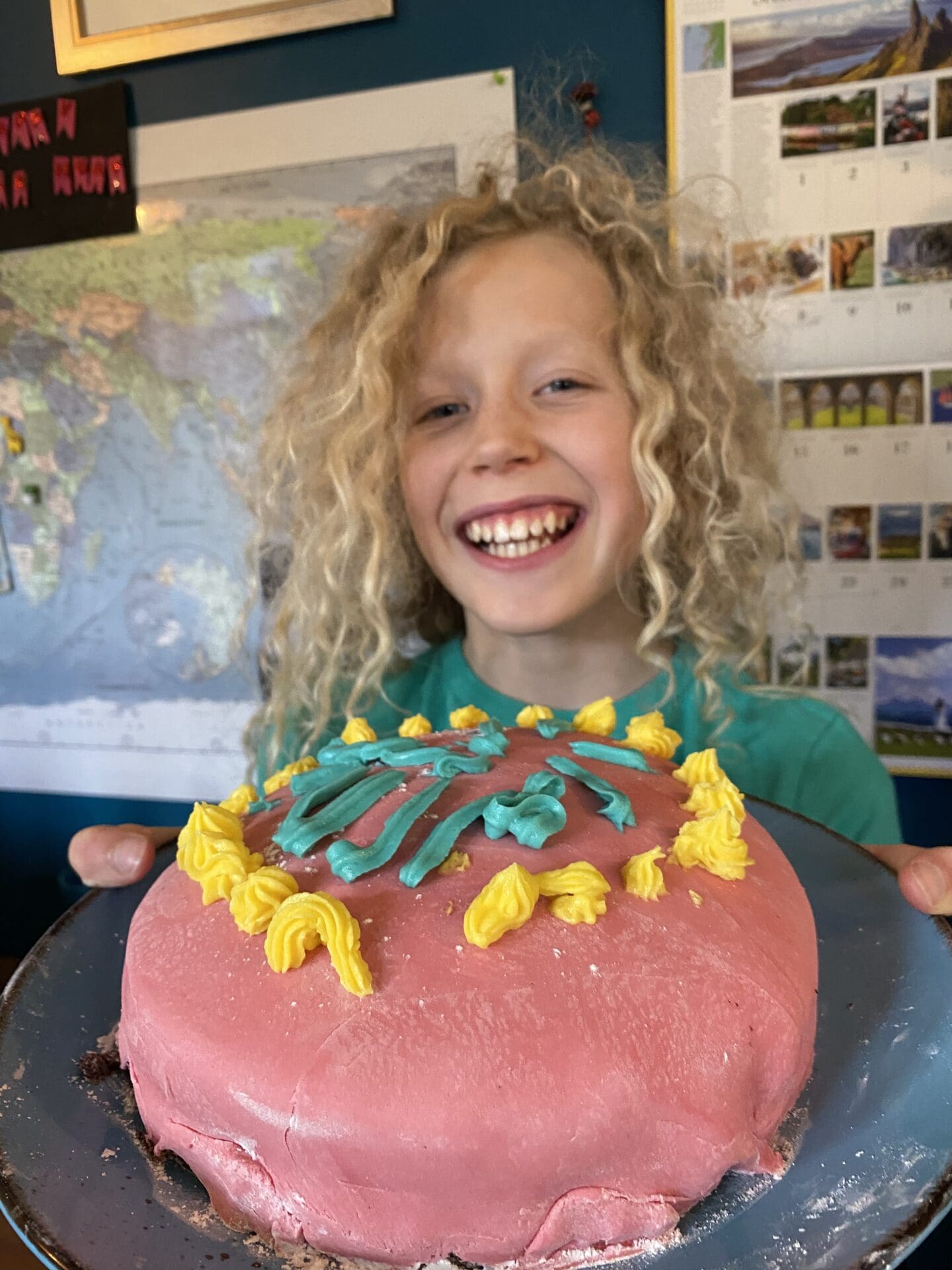 child with home made cake