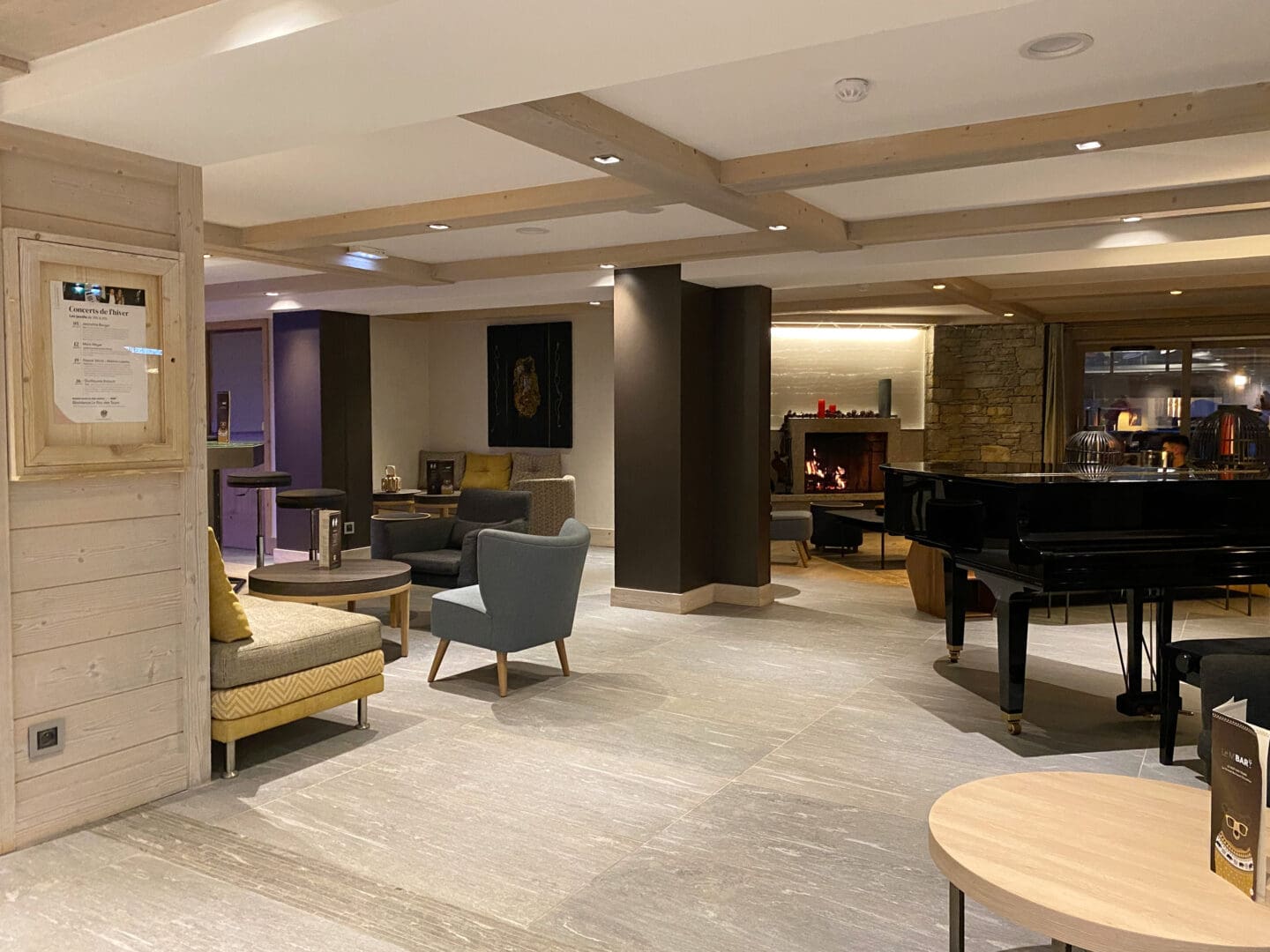 Piano and table in hotel reception