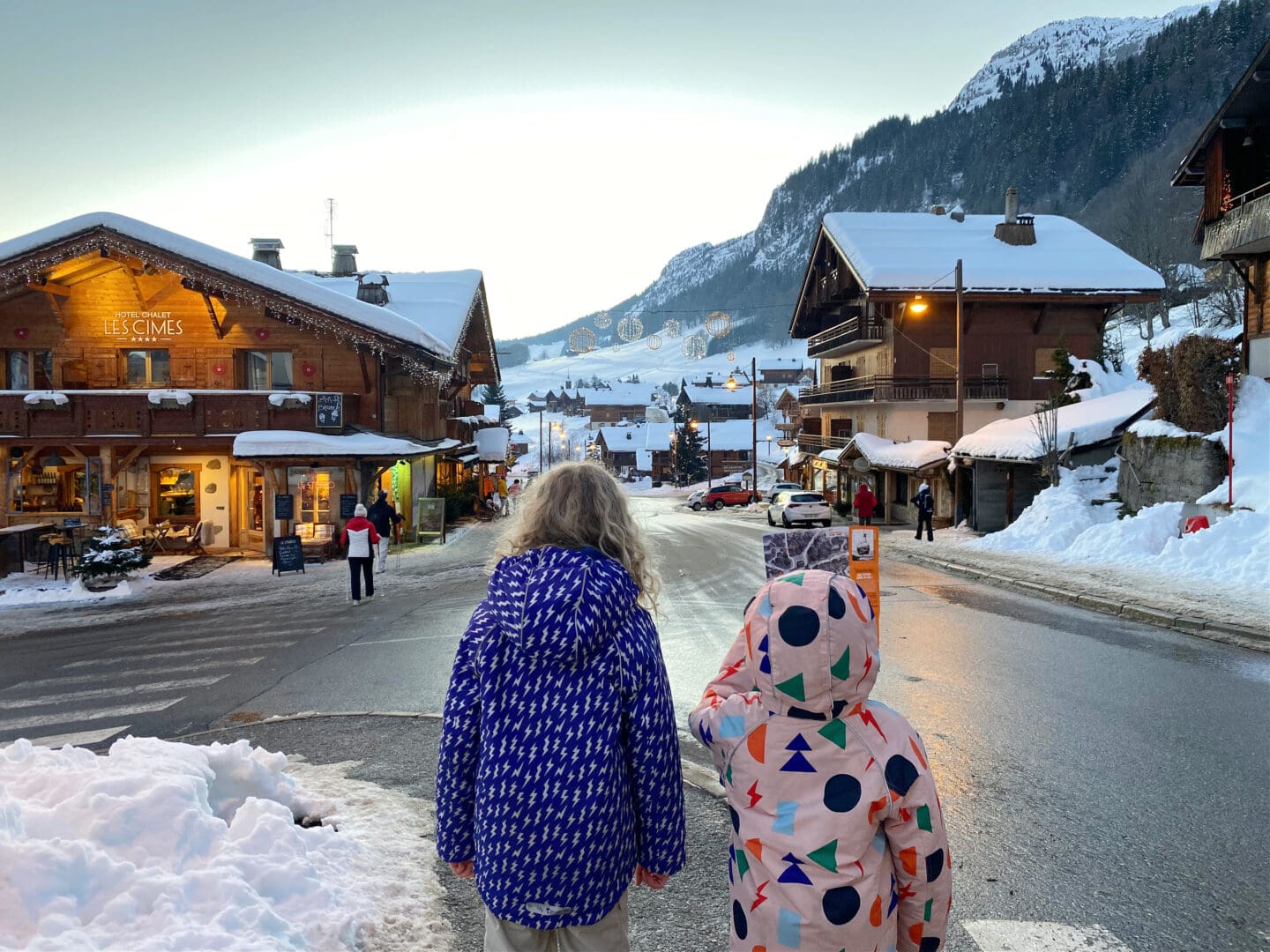 Children looking down the Main Street of Les Grand Bornand Chinallion