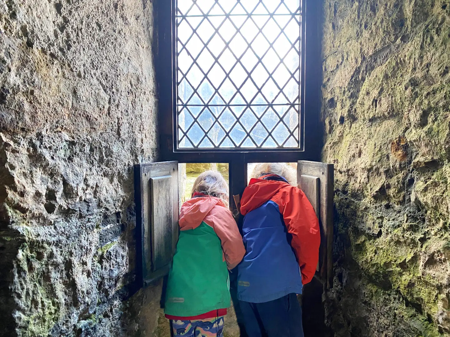 Children looking out of window on Blackness castle