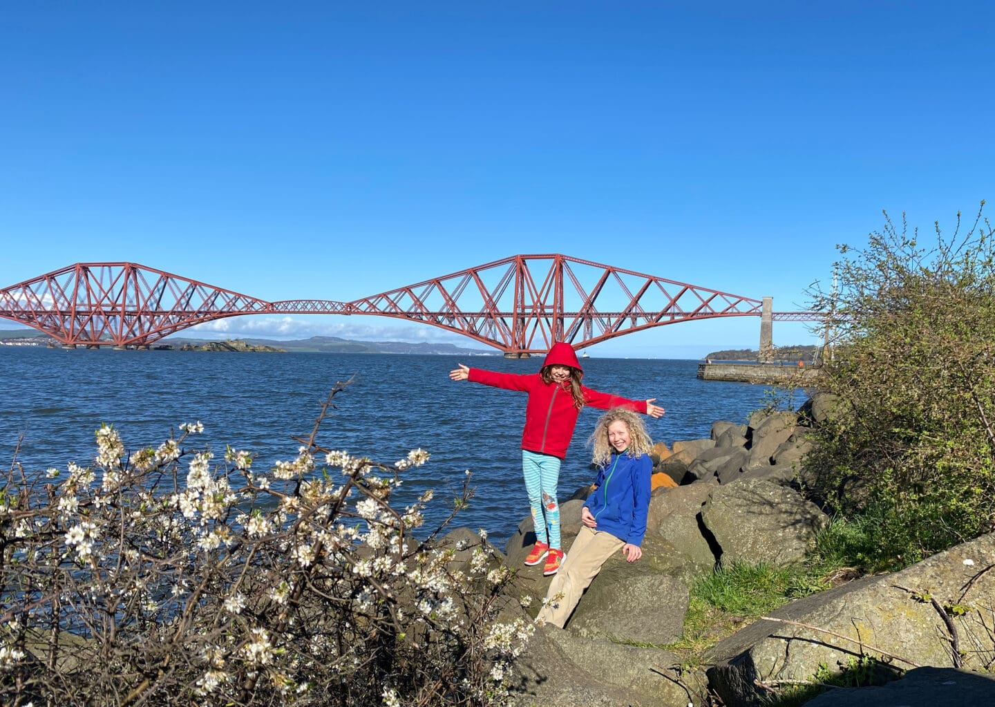 Forth bridge behind children