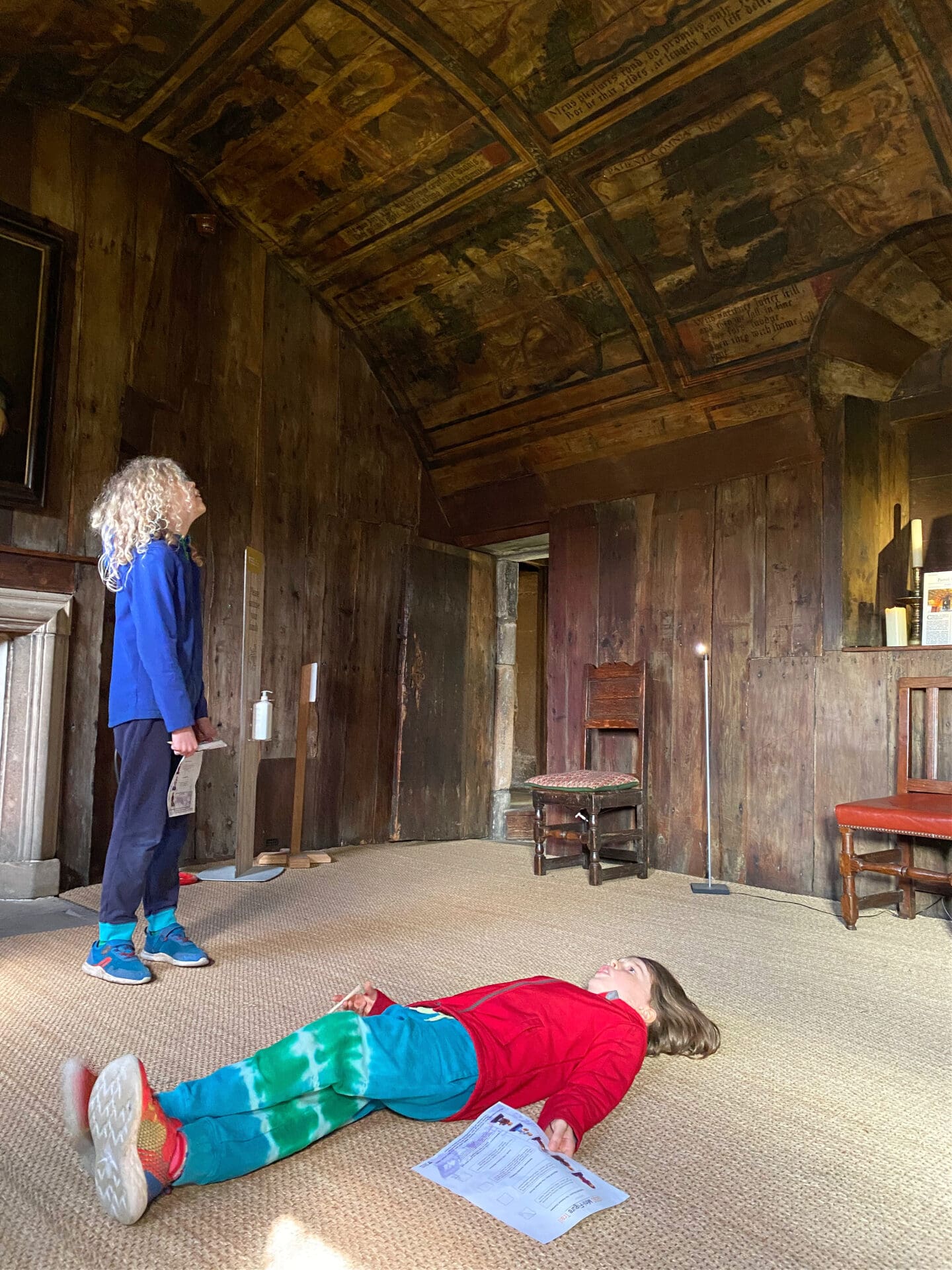 Children looking at painted ceiling