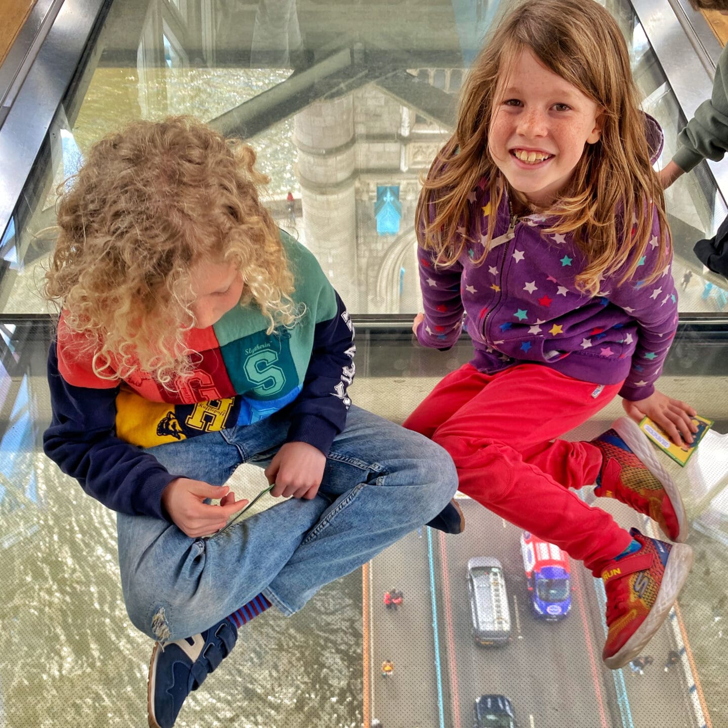 Children on London tower bridge walkway