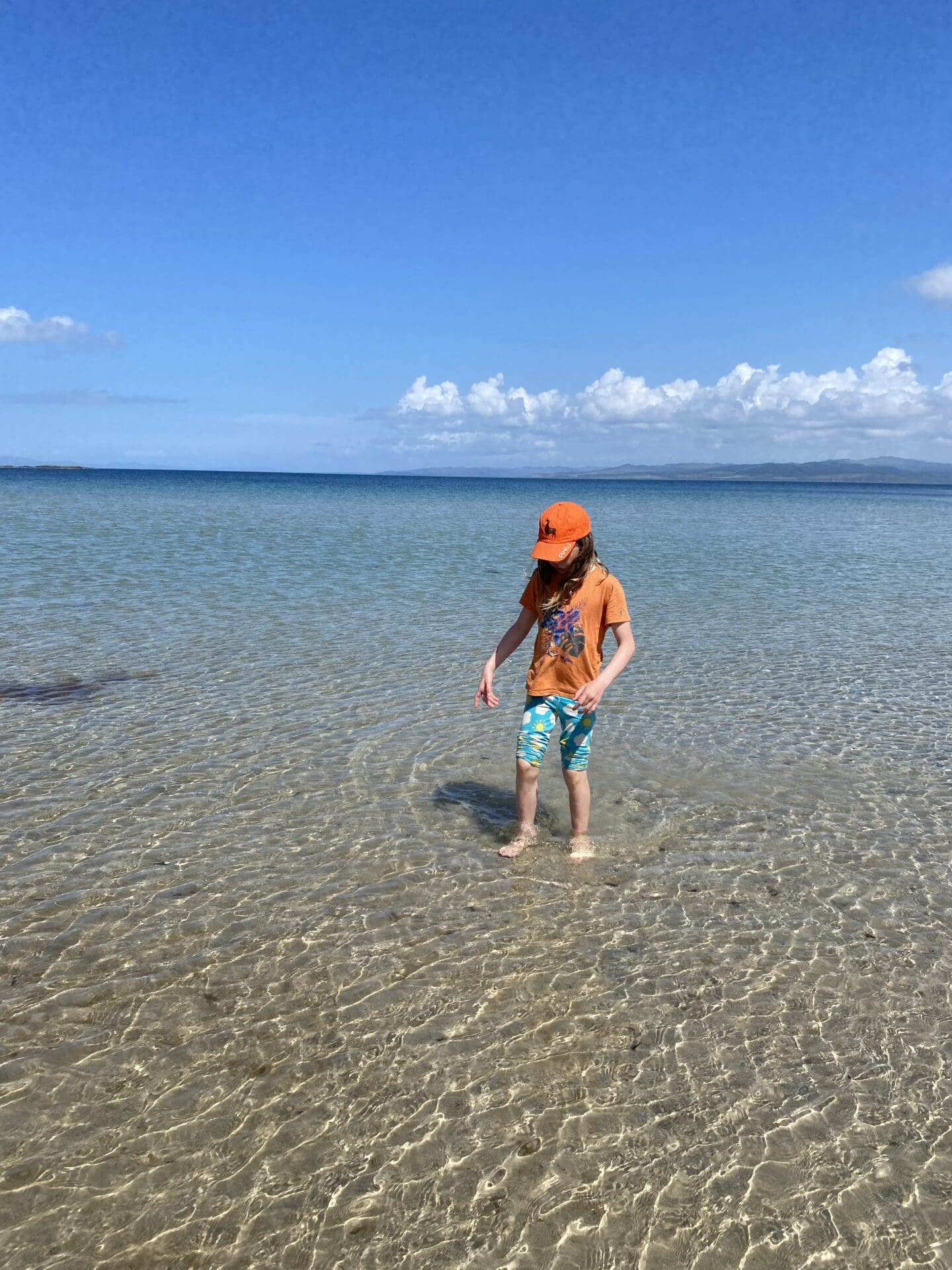 Child in the sea off Gigha