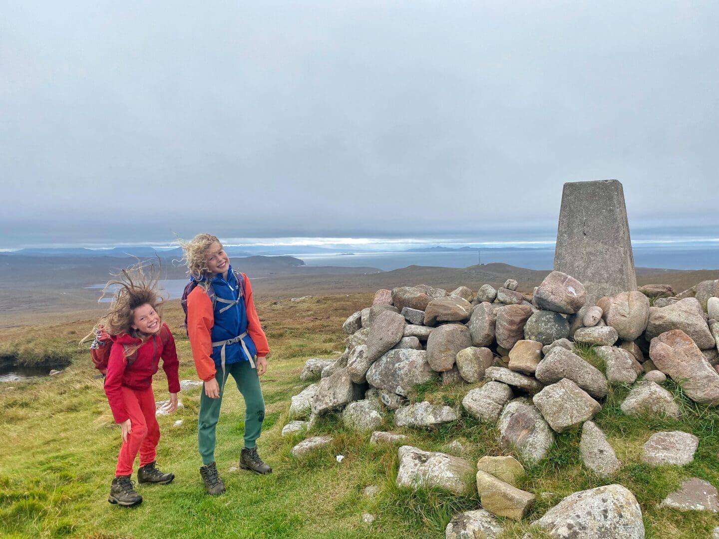 Children on top of windy hill