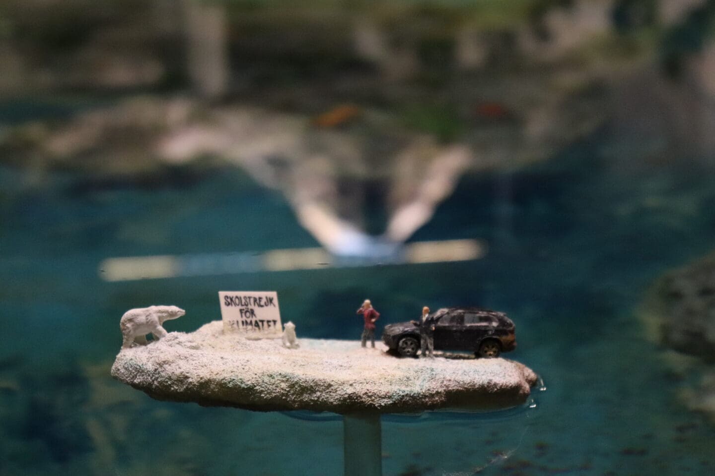 Climate change poster in model sea