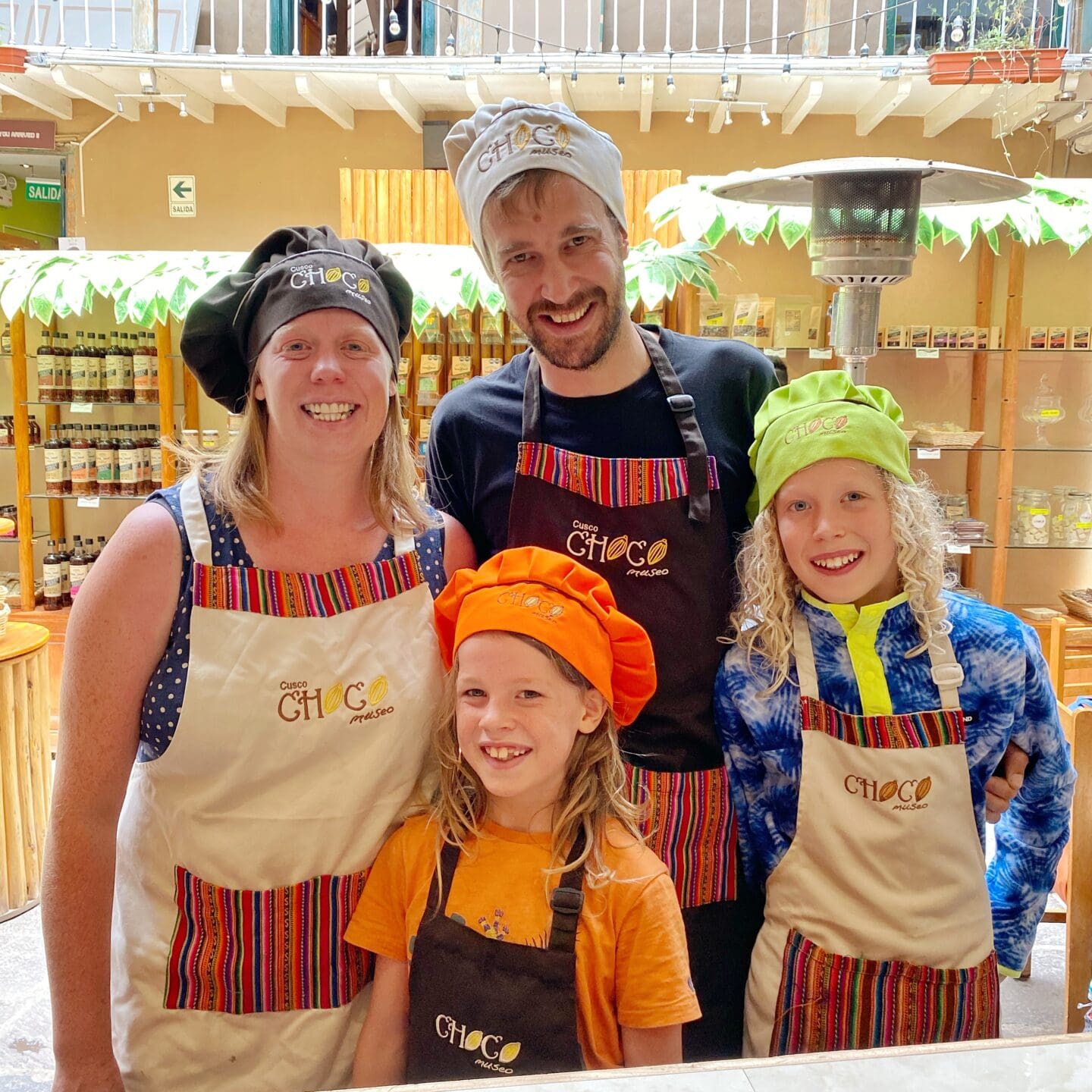 Family photo with aprons and hats
