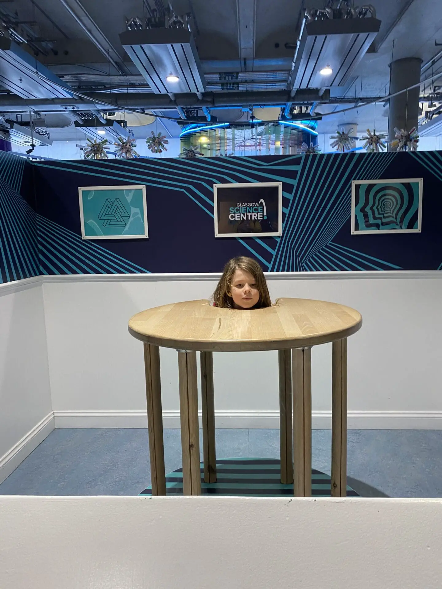 Child head in illusion at science centre