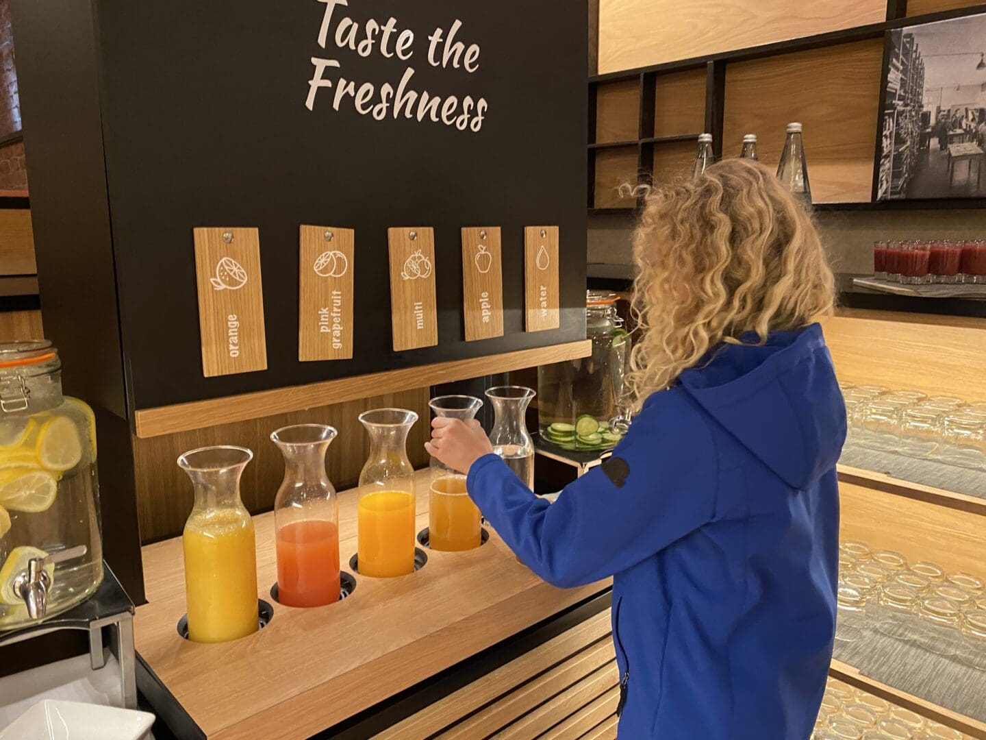 Child taking juice at breakfast