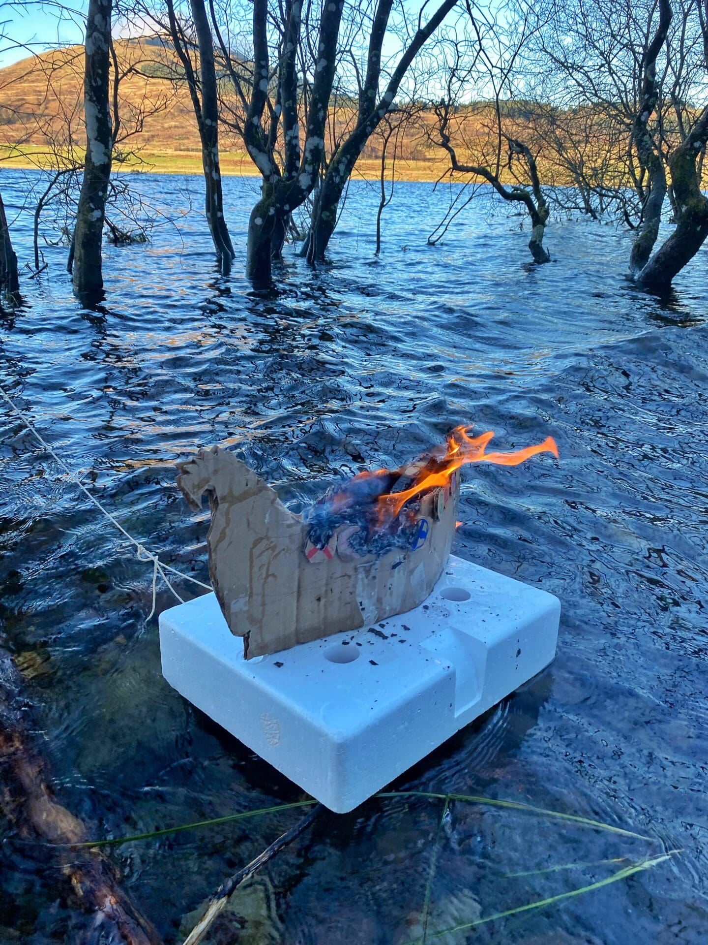 cardboard Viking boat burning