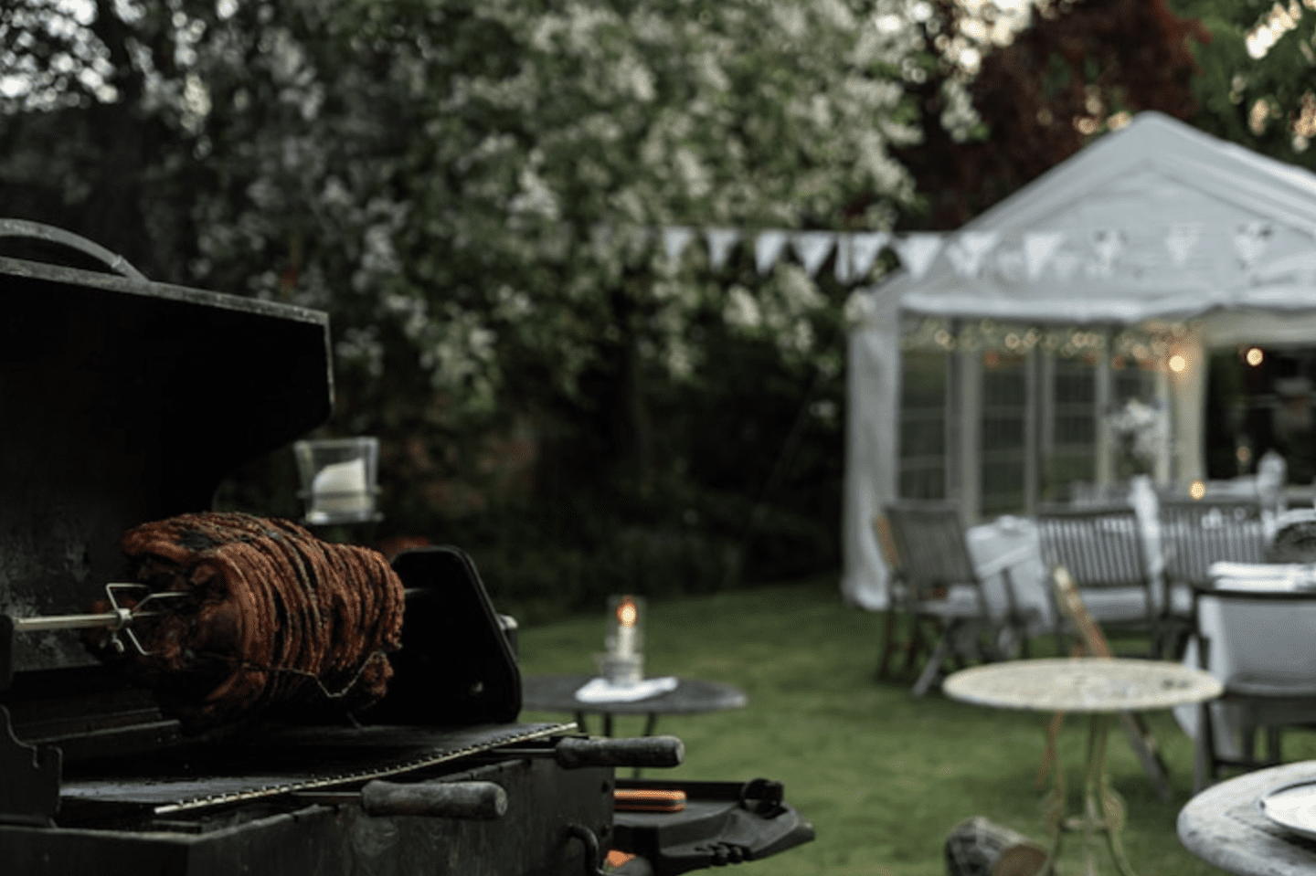 Barbecue and tent for garden party