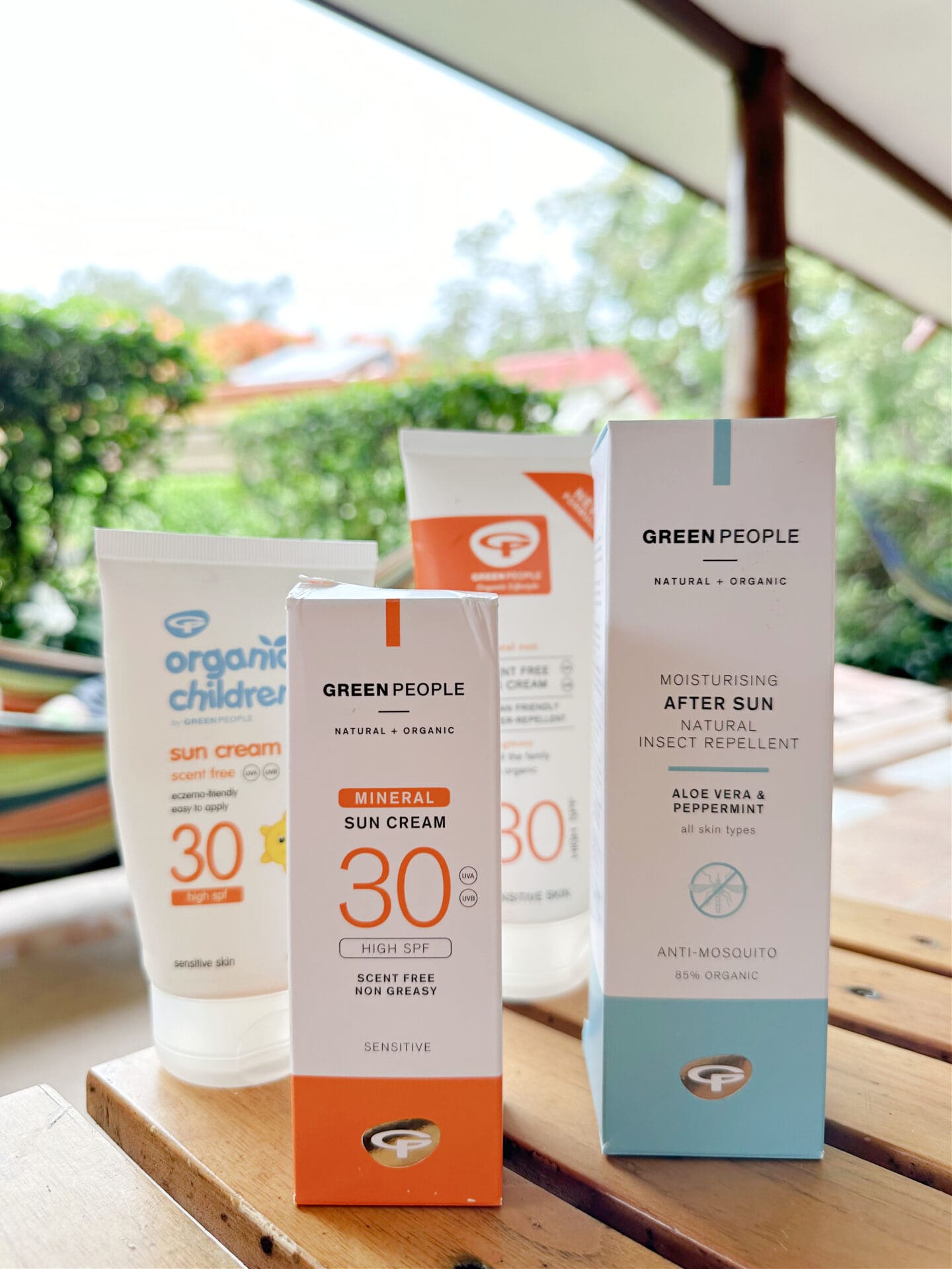 Sun cream packaging with vegetation behind